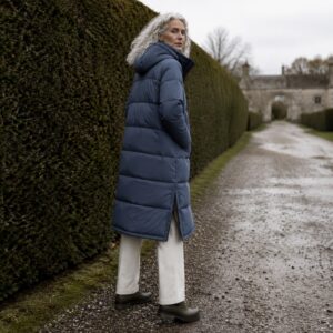 Ashcombe quilted down puffer coat — Down & Cape Outerwear by MASO. worn by a model.