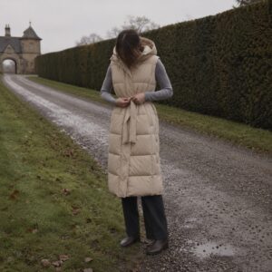 Oatlands hooded down gilet coat — Down & Cape Outerwear by MASO. worn by a model.