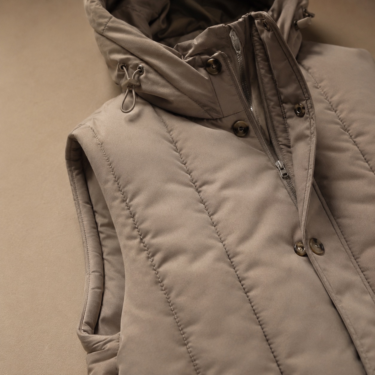 Mossgate hooded down gilet coat — Down & Cape Outerwear by MASO. close detail of the fabric and finish.