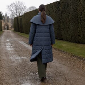 Pentlow quilted down puffer coat — Down & Cape Outerwear by MASO. worn by a model.