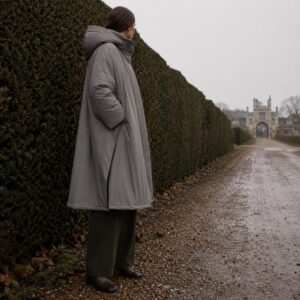 Ravenscourt hooded wool cape — Down & Cape Outerwear by MASO. worn by a model.