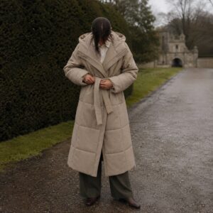 Stonebridge quilted down puffer coat — Down & Cape Outerwear by MASO. worn by a model.