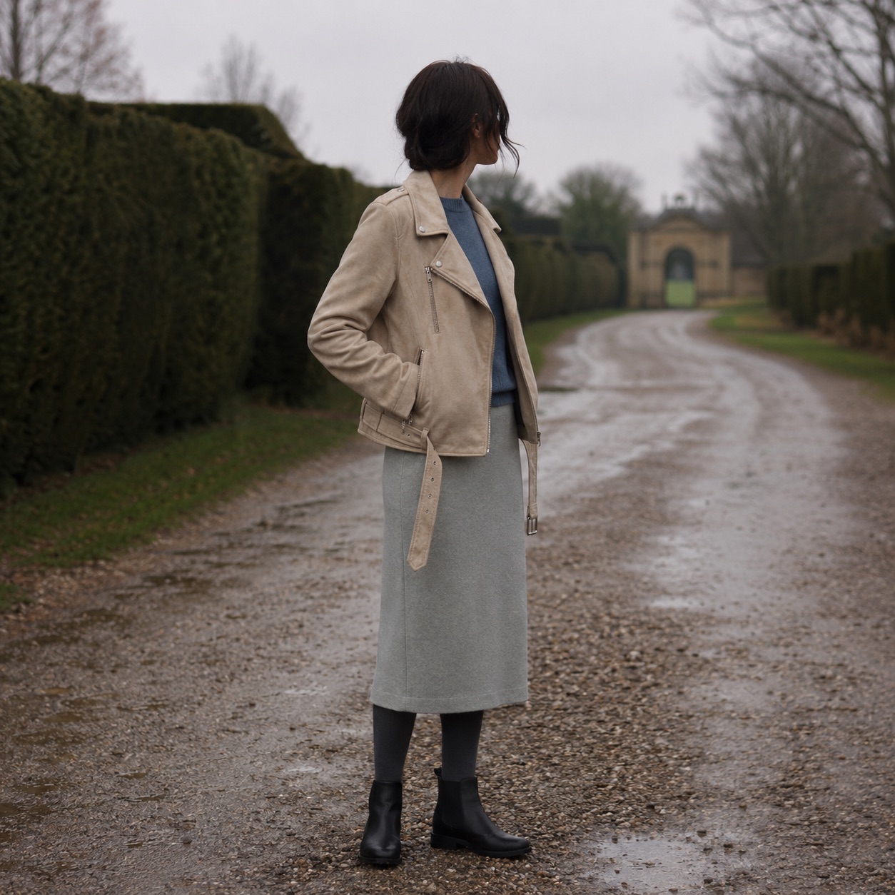Mossgate suede biker jacket — Suede & Leather Jackets by MASO. worn by a model, side view.