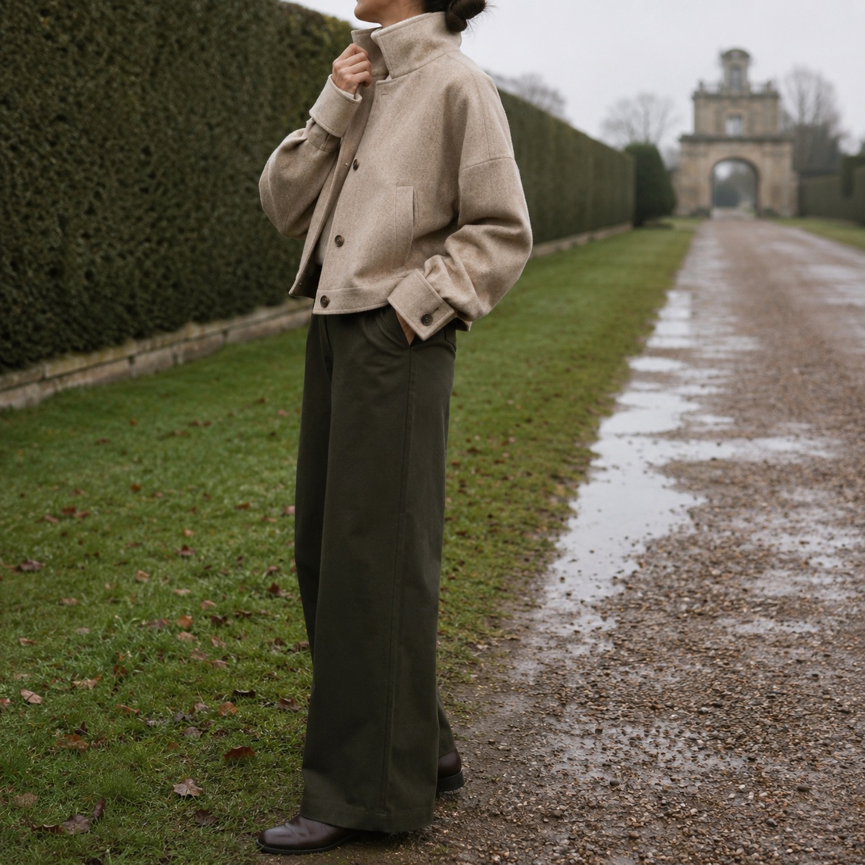 Mossgate cropped wool blouson — Short Wool Jackets by MASO. worn by a model, side view.
