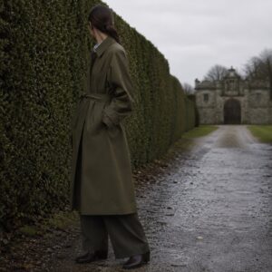 Marlowe classic belted trench — Trench Coats by MASO. worn by a model.