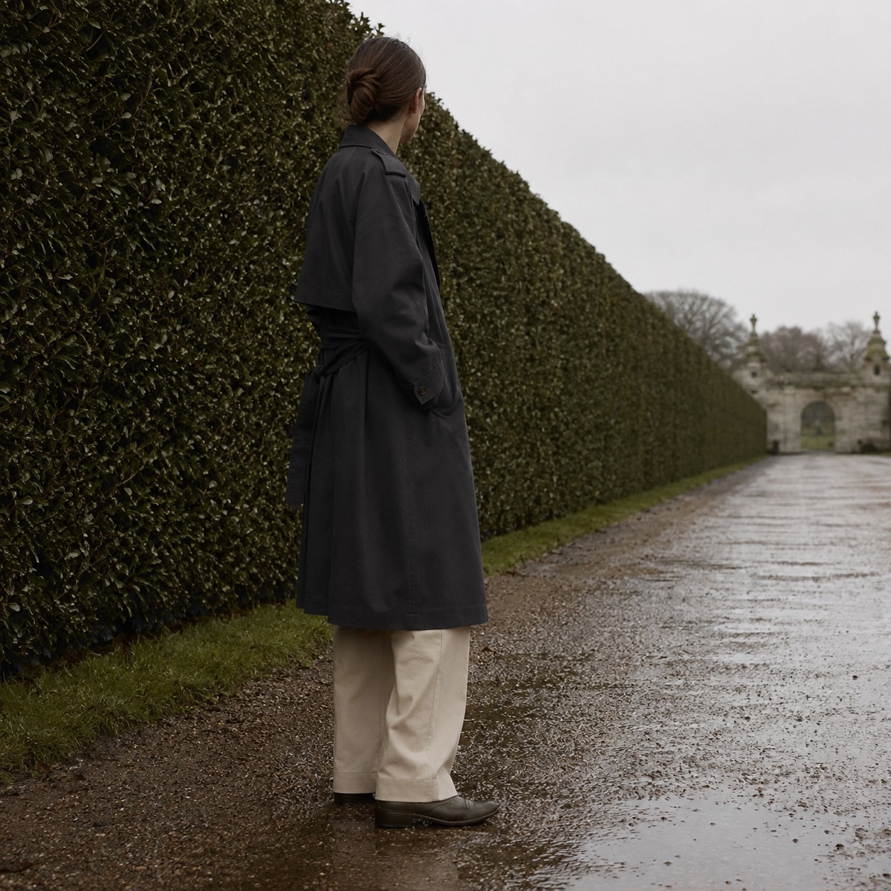 Bramwell classic belted trench — Trench Coats by MASO. worn by a model.