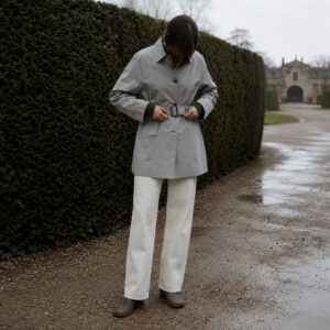 Ravenscourt short raglan trench — Trench Coats by MASO. worn by a model.