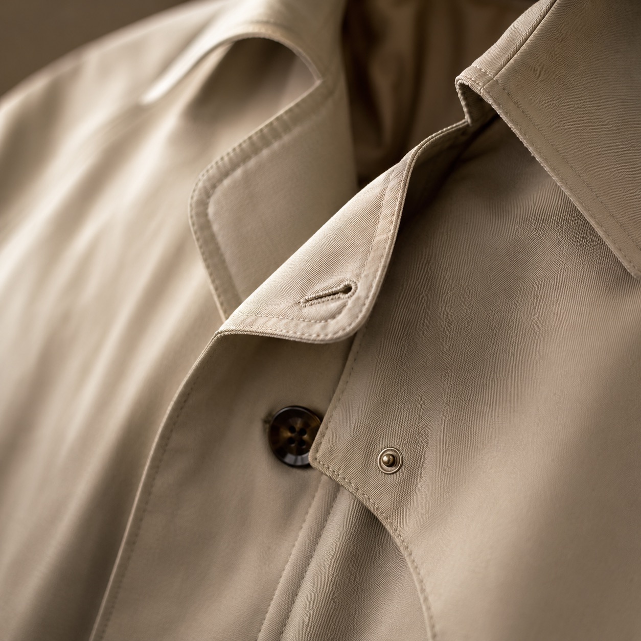 Kestrel short raglan trench — Trench Coats by MASO. close detail of the fabric and finish.