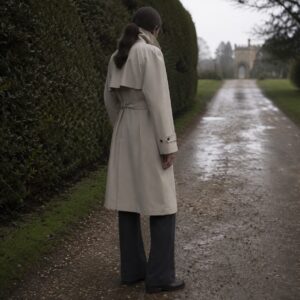 Ashcombe short raglan trench — Trench Coats by MASO. worn by a model.