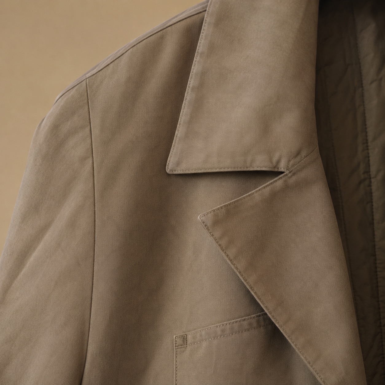 Fernhollow unlined cotton trench — Trench Coats by MASO. close detail of the fabric and finish.