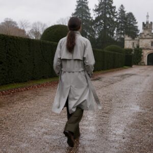 Hollowfield short raglan trench — Trench Coats by MASO. worn by a model.