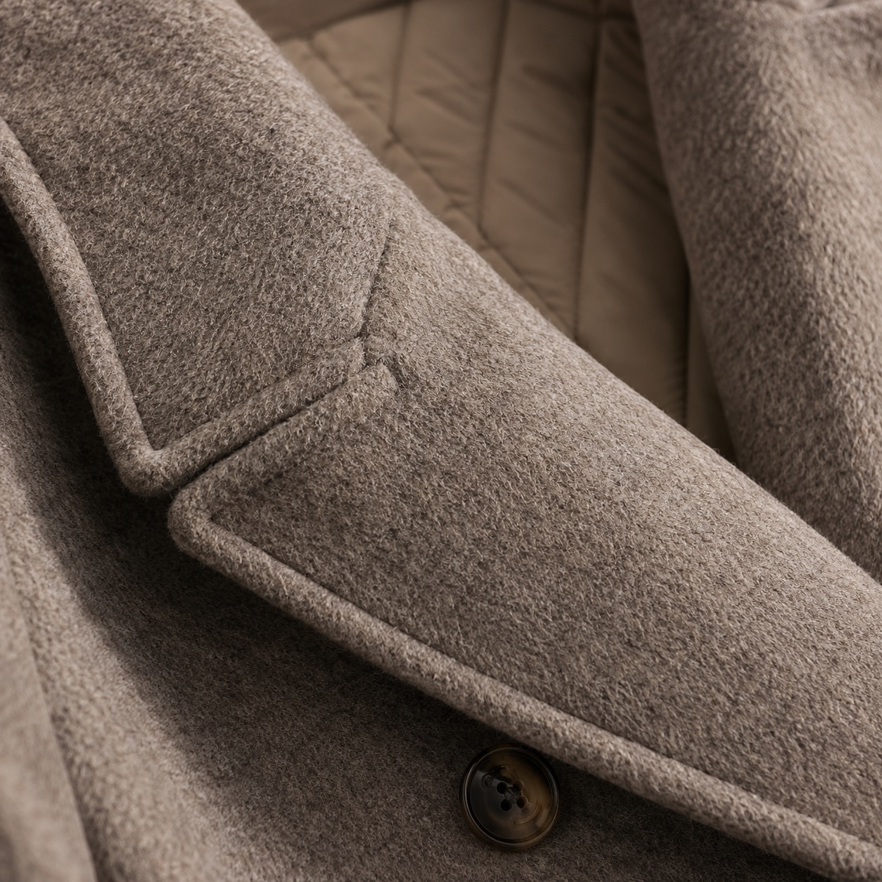 Windrush double-breasted long coat — Wool Long Coats by MASO. close detail of the fabric and finish.