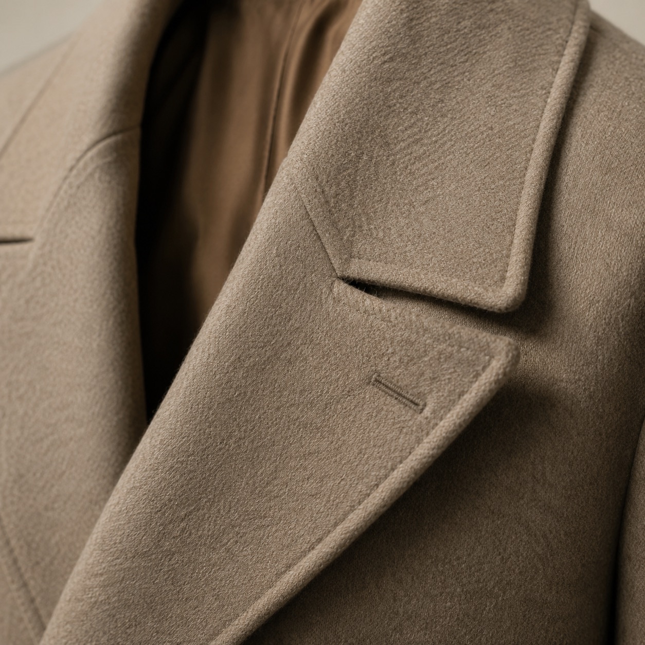 Thornleigh double-breasted long coat — Wool Long Coats by MASO. close detail of the fabric and finish.
