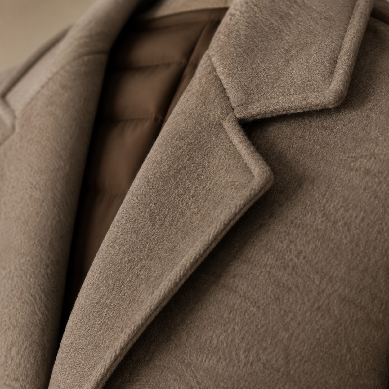 Bramwell single-breasted midi coat — Wool Long Coats by MASO. close detail of the fabric and finish.