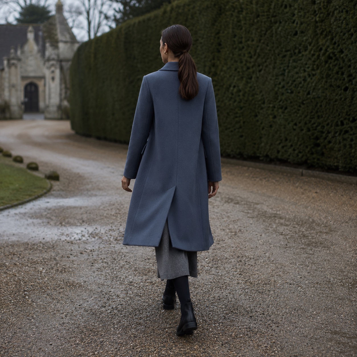 Bramwell single-breasted midi coat — Wool Long Coats by MASO. worn by a model.