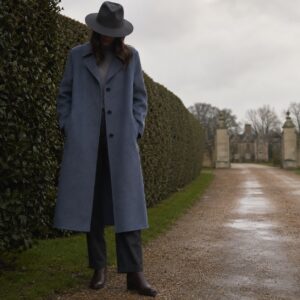 Bramwell single-breasted midi coat — Wool Long Coats by MASO. worn by a model.