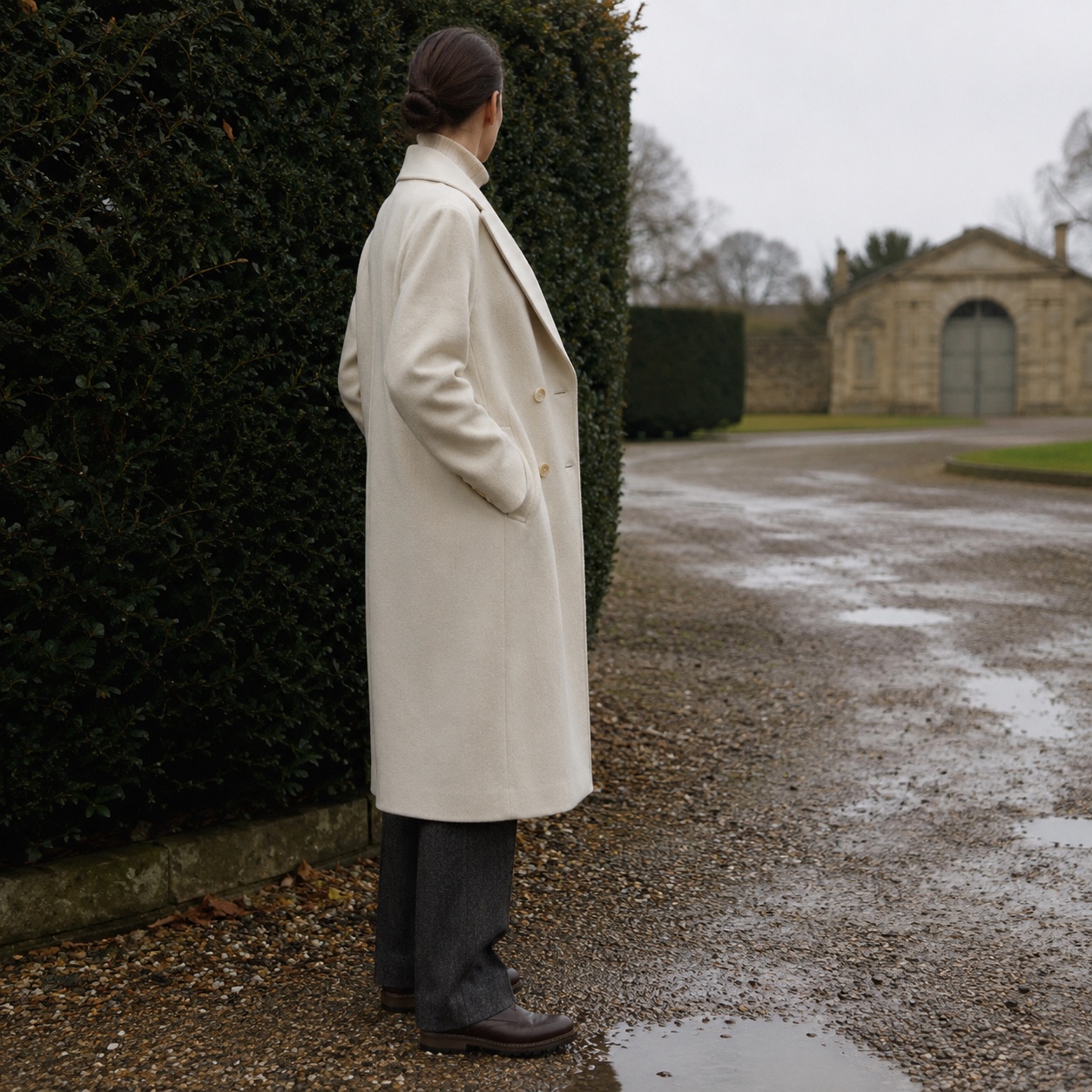 Stonebridge double-breasted long coat — Wool Long Coats by MASO. worn by a model.