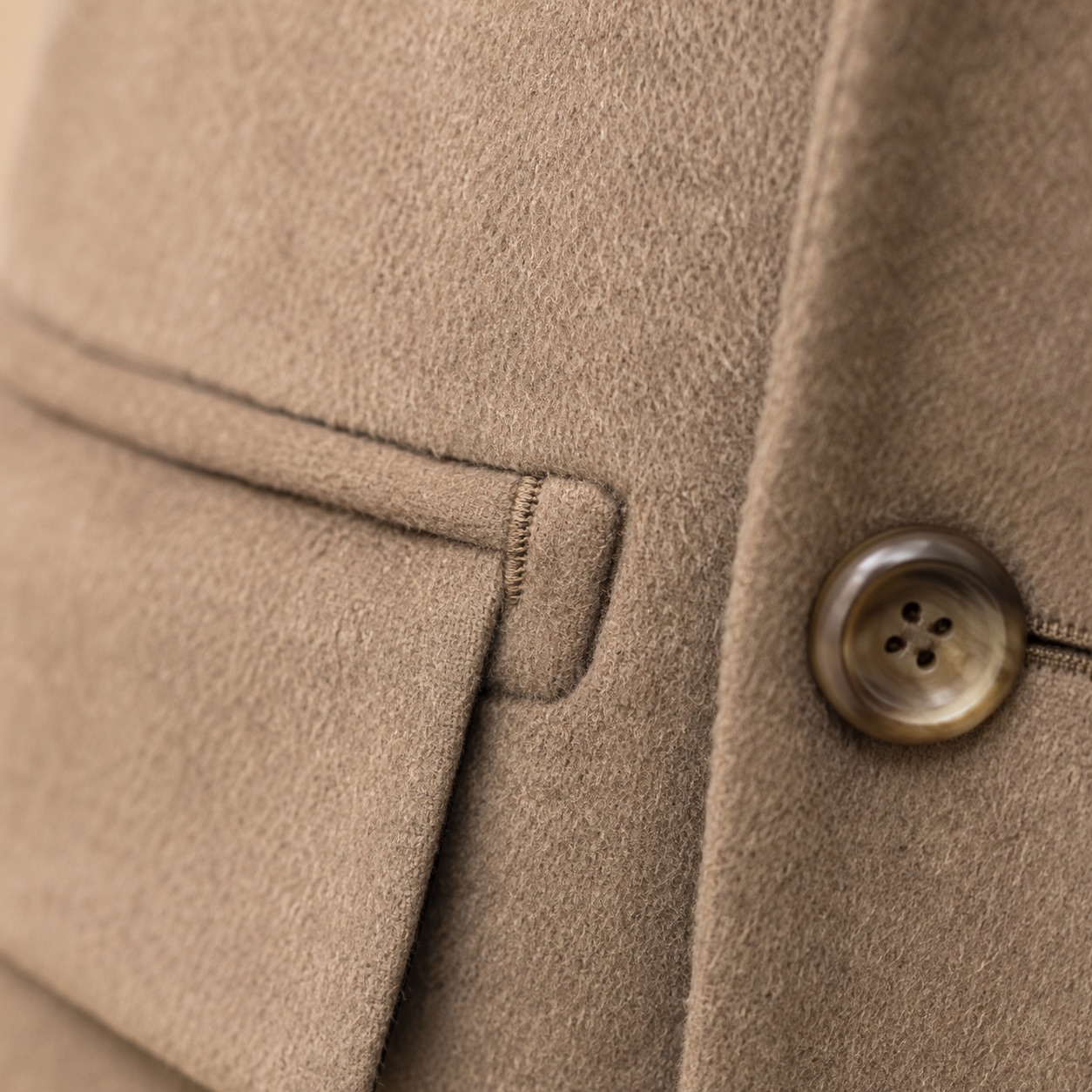 Greyfell double-breasted long coat — Wool Long Coats by MASO. close detail of the fabric and finish.