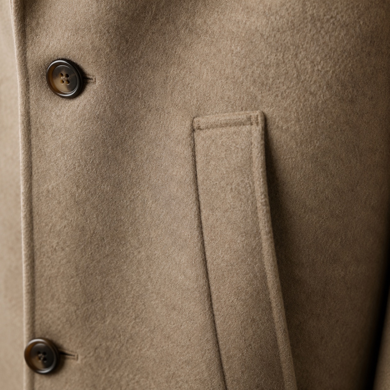 Mossgate single-breasted midi coat — Wool Long Coats by MASO. close detail of the fabric and finish.