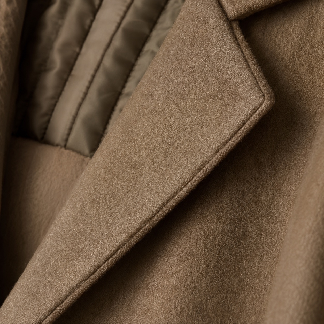 Larkspur single-breasted midi coat — Wool Long Coats by MASO. close detail of the fabric and finish.