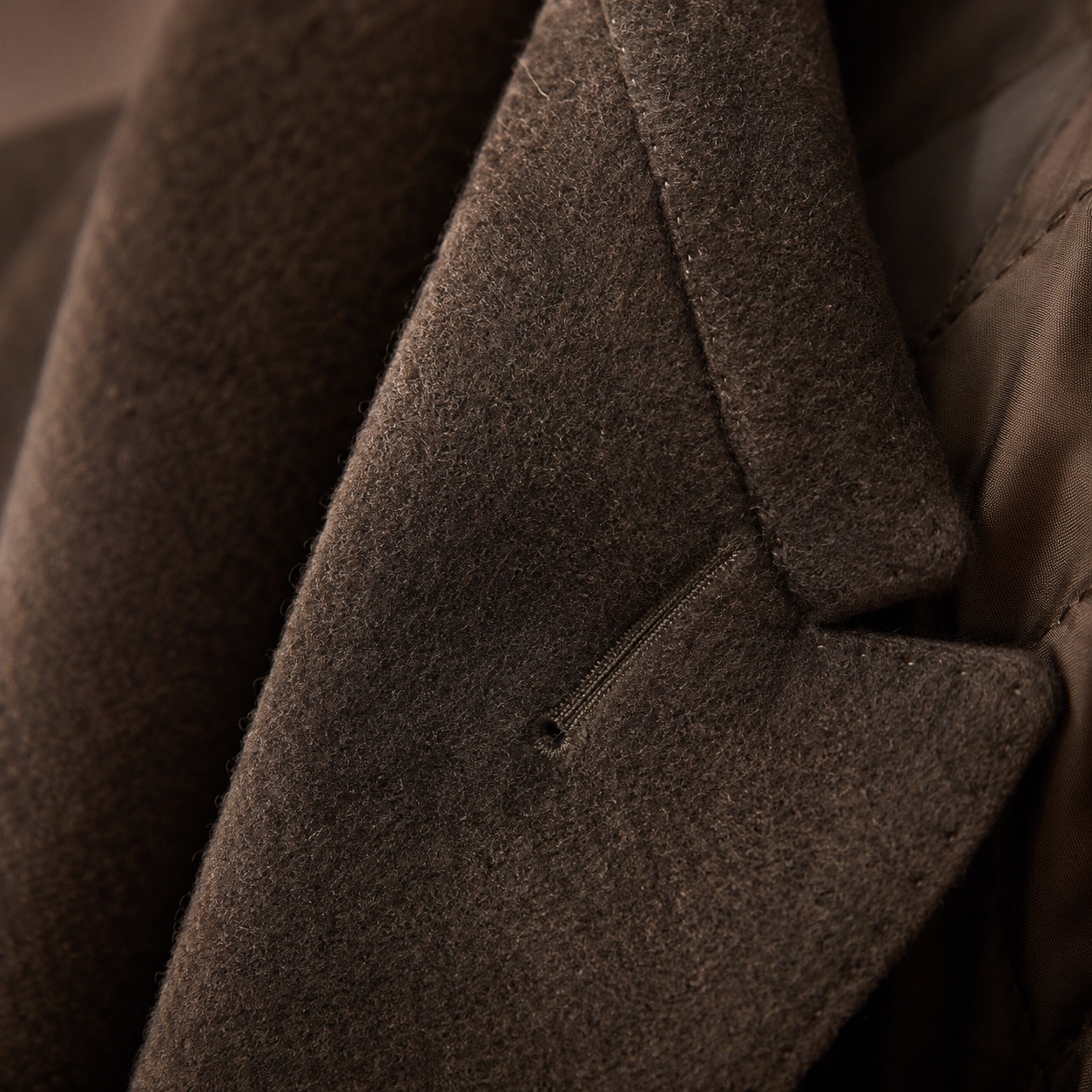 Stonebridge double-breasted long coat — Wool Long Coats by MASO. close detail of the fabric and finish.